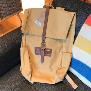 archival roll top backpack